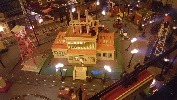 The polychrome Lionel tinplate industrial building is one of the focus areas within the layout.